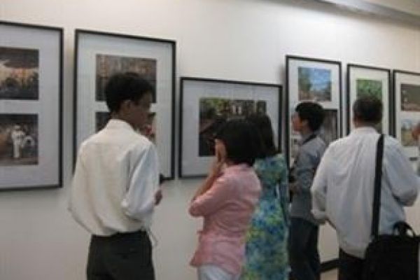 Black and white photos highlight the image of Hanoi