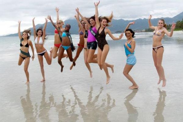 Miss Earth contestants on Doc Let Beach