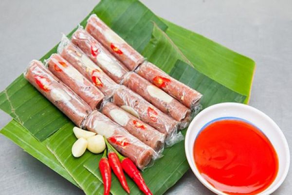Vietnamese fermented pork roll- Nem chua Vietnam cuisine